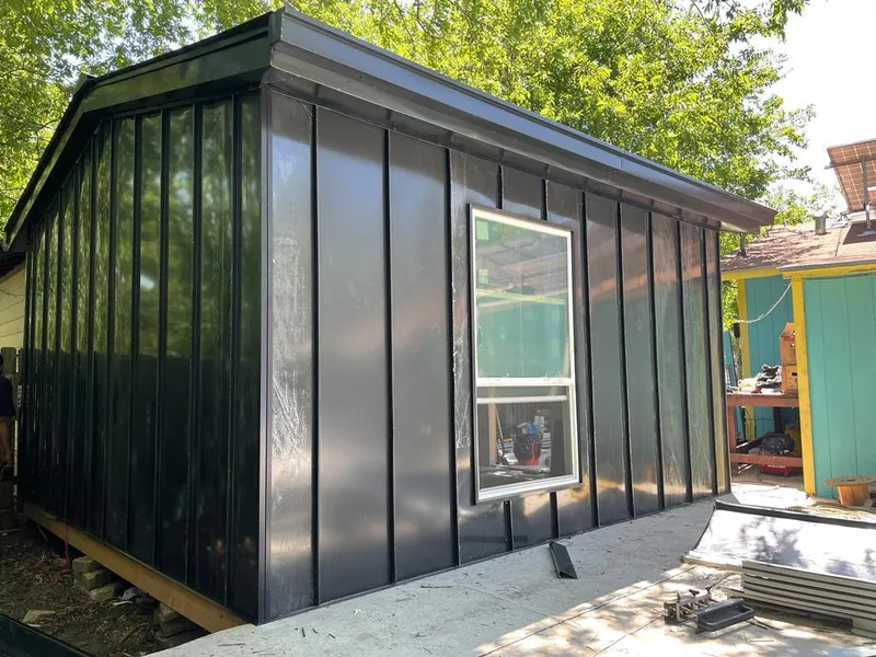 Black standing seam metal wall panels for Metal Roof Installation in Oneonta